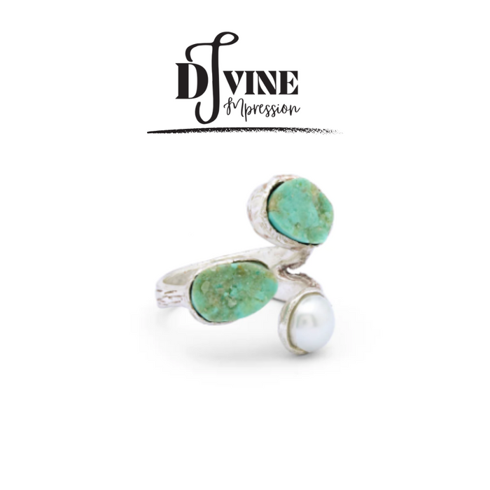 HAND CRAFTED SILVER RING FEATURING TURQUOISE GEMSTONE