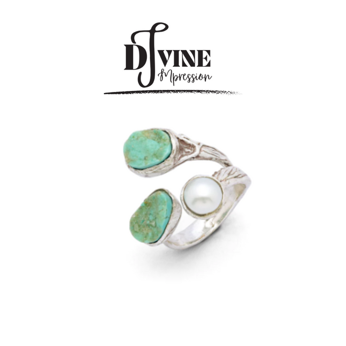 HAND CRAFTED SILVER RING FEATURING TURQUOISE GEMSTONE